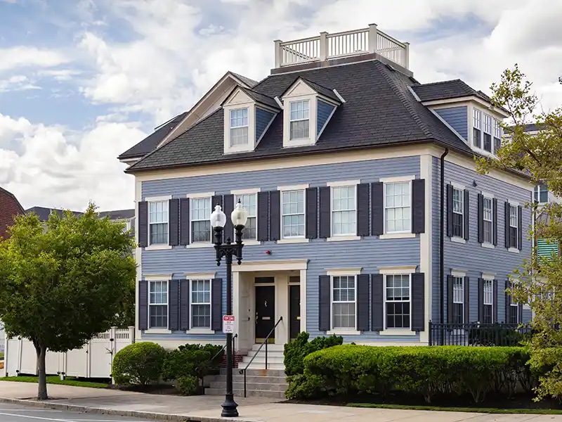 Light blue multi-family home