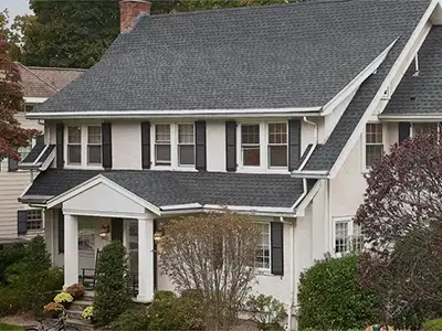 Mid-class home with a gray shingle roof
