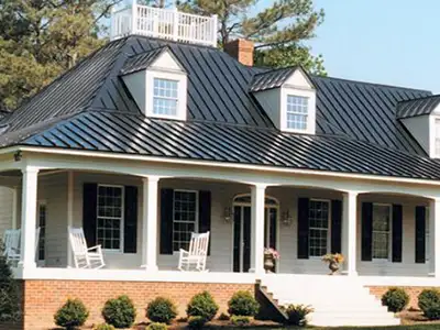 Mid-class home with a dark gray metal roof